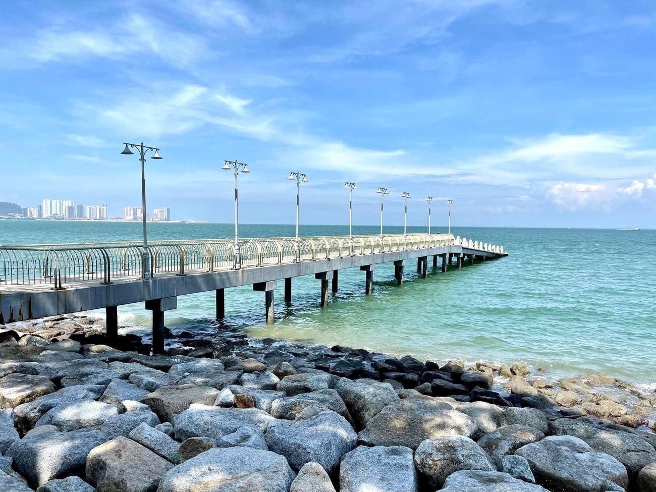beautiful pier of eastern and oriental hotel under blue sky the infamous hotel located at penang malaysia one of the finest hotel in malaysia.